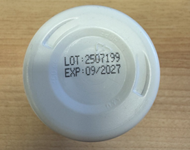 Photograph of bottom of TNVitamins bottle showing Lot 2507199 with Exp 09/2027