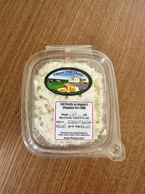 Photograph of Clover Hill Dairy Soft Ricotta with Jalepeno’s (Requeson Con Chile) in clam shell, 1.0 lbs