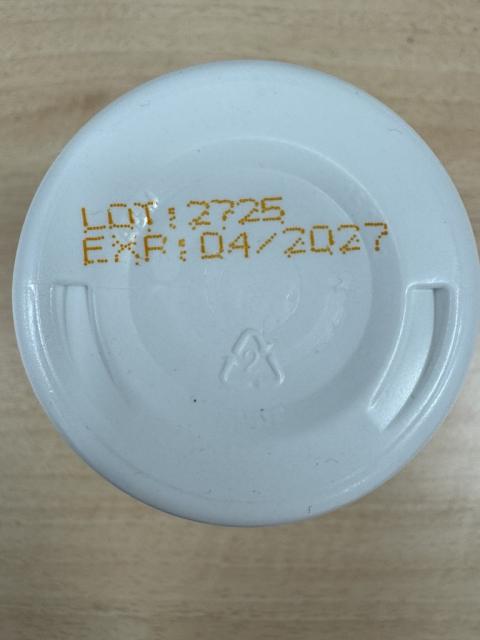 Photograph of bottom of bottle showing LOT: 2725 and EXP: 04/2027