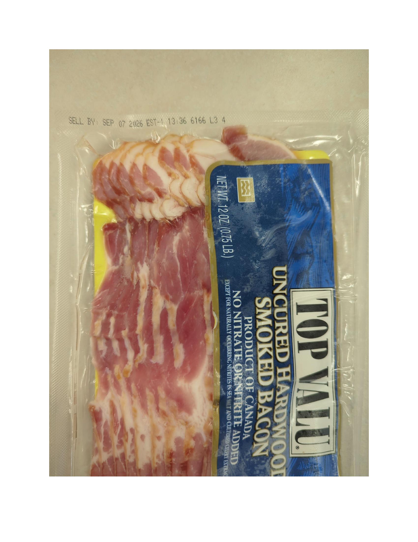 Product label for 12-oz vacuum package of "Royale Natural Applewood Smoked ALL NATURAL Uncured Bacon Product of Canada" with sell by dates of "SEP 01 2026" and "SEP 07 2026" printed on the side of the package; 12-oz vacuum package of "TOP VALU Uncured Hardwood Smoked Bacon PRODUCT OF CANADA" with various sell by dates of "SEP 01 2026", "SEP 02 2026", "SEP 04 2026", "SEP 05 2026", and "SEP 07 2026" printed on the side of the package (page 5)
